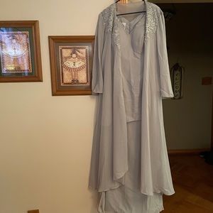 Beautiful light grey dress with light overlay.